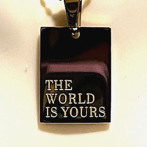 “ The World Is Yours” pendant necklace. Stainless ssteel.